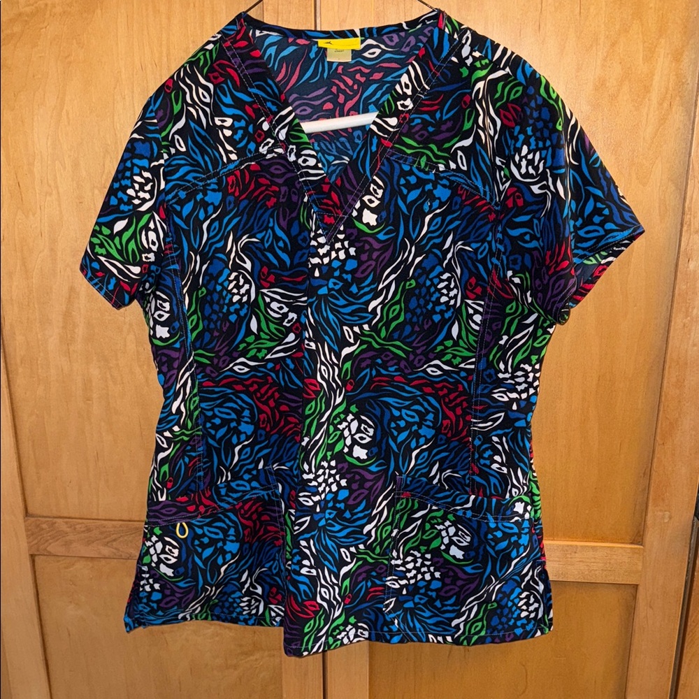 Multi-patterned scrub top.